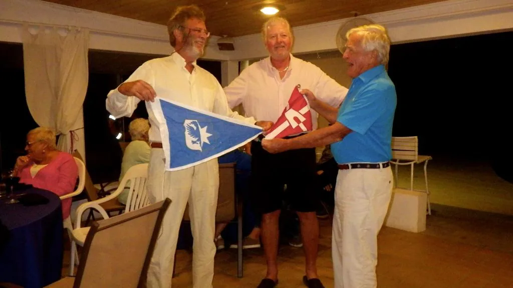 Commodore of the RYC exchanging burgees with St Croix Yacht Club, USVI